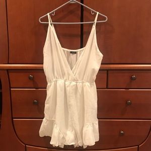 Solid plunge neck ruffle hem slip romper